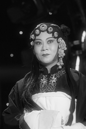 LUANNAN COUNTY - JANUARY 6: The PingJu Qin Xianglian image on the stage, in the ChengZhaoCai grand theater, January 6, 2014,luannan county, hebei province, china.のeditorial素材