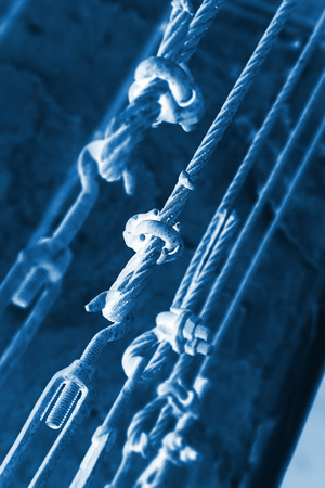 steel wire rope full of greasy dirt and connection fastenersの写真素材