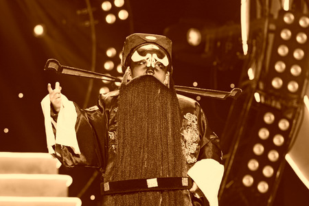 LUANNAN COUNTY - JANUARY 6: The boy Performing PingJu on the stage, in the ChengZhaoCai grand theater, January 6, 2014,luannan county, hebei province, china.のeditorial素材