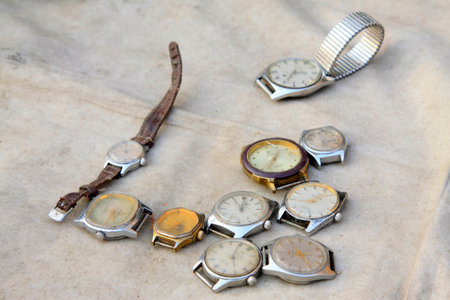 Old watch and bracelet in the booth, closeup of photo