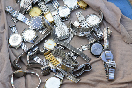 Old watch and bracelet in the booth, closeup of photoのeditorial素材