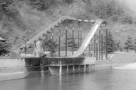 PINGGU COUNTY - APRIL 12: Mass water sports entertainment - surging ahead, in the stone forest canyon scenic spot, April 5, 2014, Pinggu county, beijing, China.のeditorial素材