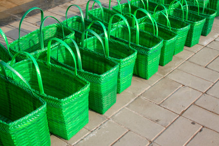 Green plastic basket, closeup of photoの写真素材