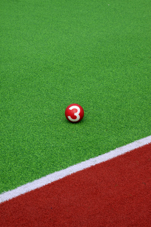 Chinese gate ball on the green plastic pitchのeditorial素材