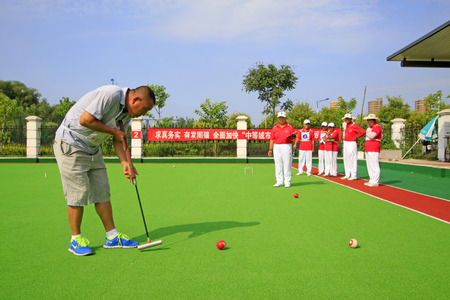 LUANNAN COUNTY - AUGUST 29: Chinese gate ball match scene, on August 29, 2015, Luannan County, Hebei Province, China.のeditorial素材