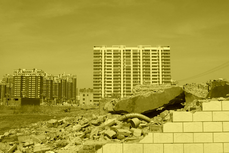 LUANNAN COUNTY - APRIL 6: Housing demolition materials in the demolition site and new building, April 6, 2014, Luannan county, hebei province, China.のeditorial素材