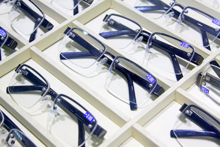 Convex glass on the shelf, closeup of photoの写真素材