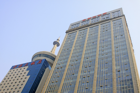 Shijiazhuang - April 30: kailuan hotel and fortune securities building, on April 30, 2015, shijiazhuang city, hebei province, Chinaのeditorial素材