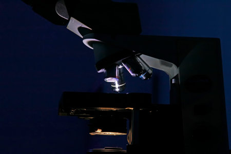 Microscopic lens in dark environment, closeup of photoの写真素材