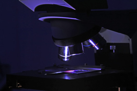 Microscopic lens in dark environment, closeup of photoの写真素材
