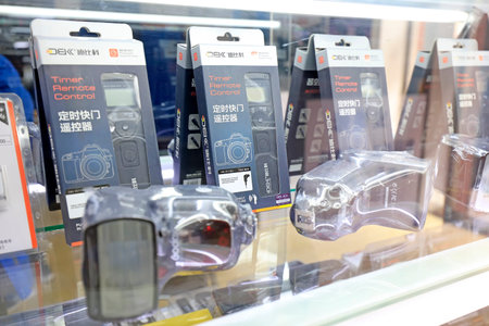 Tangshan - March 6: photography remote controls and flash on the shelf, in a photographic equipment...