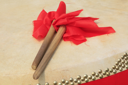 Chinese style drums and hammer, closeup of photoの写真素材