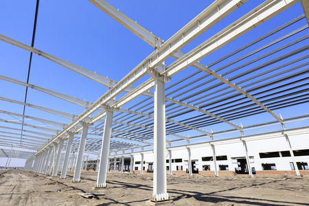steel girder truss under blue sky, closeup of photoのeditorial素材