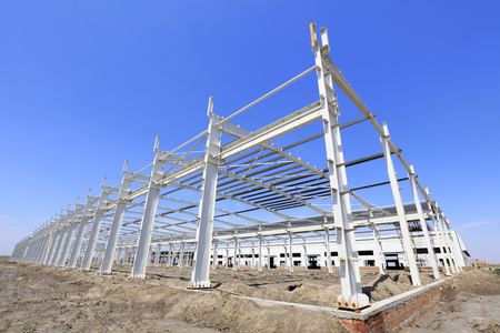 steel girder truss under blue sky, closeup of photoのeditorial素材