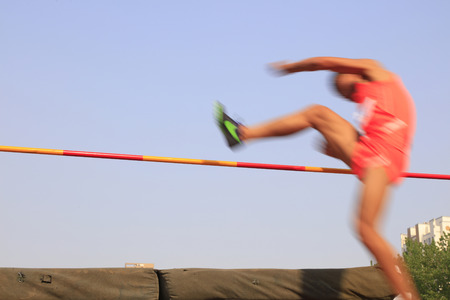 man high jump athlete in the playgroundのeditorial素材