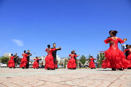 Tangshan - August 8: Latin dance performances in the park, August 8, 2016, tangshan city, hebei province, Chinaのeditorial素材