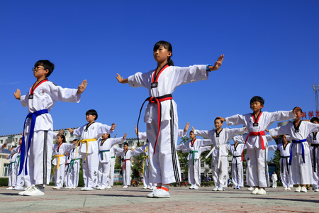 Tangshan - August 8: Taekwondo performances in the park, August 8, 2016, tangshan city, hebei province, Chinaのeditorial素材