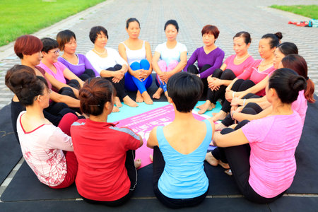 Tangshan City - September 4: women doing yoga exercise in the park, on September 4, 2016, tangshan...