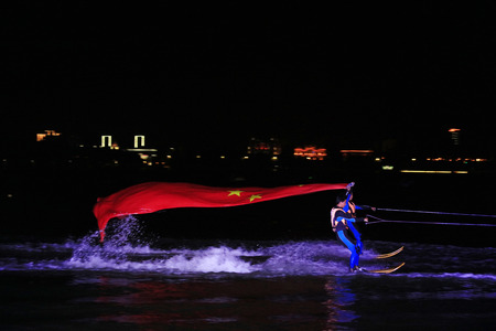 Tangshan - August 27: Water skiing performances at night, on August 27, 2016, tangshan city, hebei province, Chinaのeditorial素材