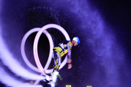 Water stunts performance at night in a parkのeditorial素材