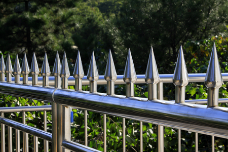 Stainless steel fence in the parkの写真素材
