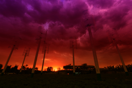 vertical axis wind turbine under blue skyのeditorial素材