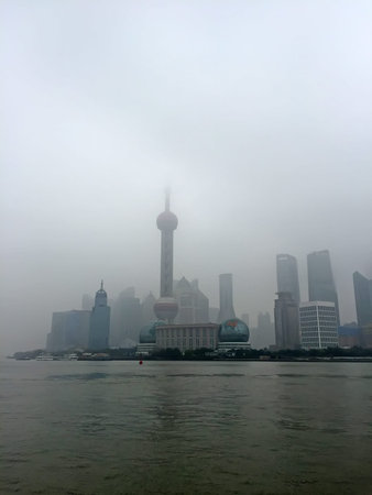 Shanghai city building in the fog and haze