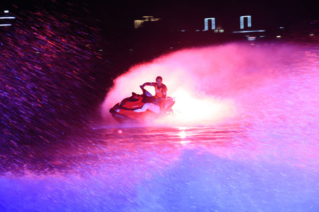 Tangshan - August 27: Motorcycle stunt show at night, hebei province, Chinaのeditorial素材