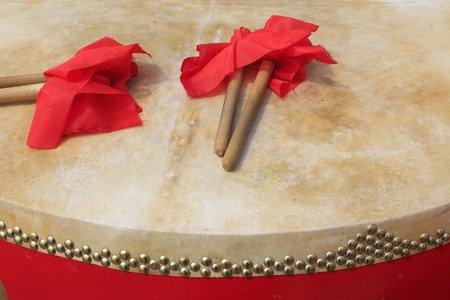 Chinese style drums and hammer, closeup of photoの写真素材