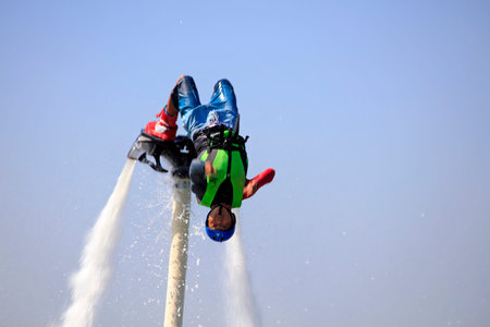 Water stunts performance in a park