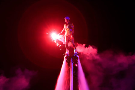 Tangshan - August 27: Water stunts performance at night in a park, on August 27, 2016, tangshan...