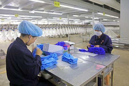 Tangshan City - October 19, 2016: Tangshan Zhonghong NBR medical gloves production line, Tangshan City, Hebei, China, China

のeditorial素材