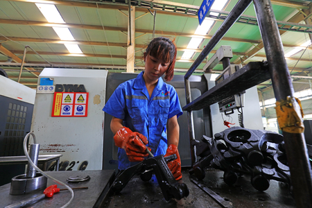 Tangshan City - August 26, 2017: workers in the production line, in a factory, Tangshan City, Hebei, China
のeditorial素材