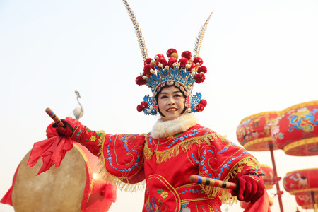 Tangshan City - February 20, 2018: Women drum performance in the park, Tangshan City, Hebei, Chinaのeditorial素材