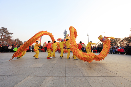 Tangshan City - February 20, 2018: dragon dance performance in parks, Tangshan City, Hebei, Chinaのeditorial素材