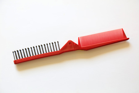 Red plastic combの写真素材