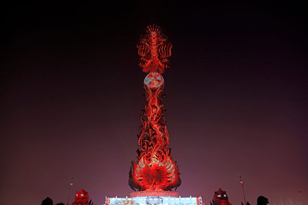 Phoenix sculpture in the night sky, Tangshan City, Chinaのeditorial素材