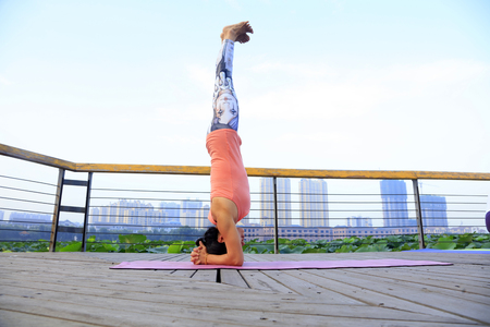 women doing yoga exercise in the park, Chinaのeditorial素材