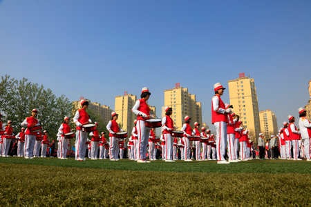 Luannan County-April 21, 2016: strike bands stand on the playground, Luannan, Hebei, Chinaのeditorial素材