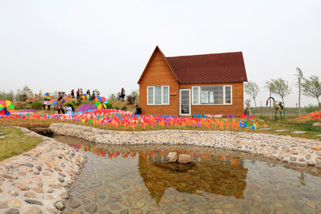 Colorful windmills and cabin poolsのeditorial素材