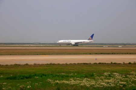 Shanghai City-August 28, 2018: Airliner taxiing on runway, Shanghai Pudong International Airport, Chinaのeditorial素材