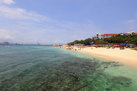 Sanya City, Hainan-March 31, 2019: Tourists on the beach Wuzhizhou Island, Sanya City, Hainan Province, Chinaのeditorial素材