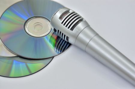 microphone and disks isolated on a white backgroundの写真素材