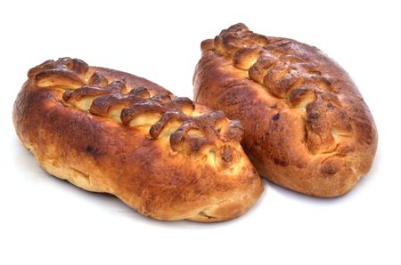 two greater and tasty pies close up on a white backgroundの写真素材