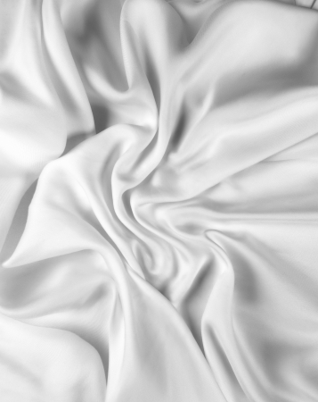 Smooth elegant white silk can use as backgroundの写真素材