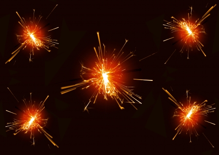 Burning christmas sparklerの写真素材