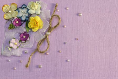 Flower Plant Floral Nature Designs.Colourful handmade paper flowers on pink background.Paper craft Flower Decoration Concept.Hobby of paper sheet.Children's creativity.Creative creativity.Lilac,purpleの写真素材