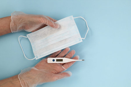 Surgical protective mask for face. Flu virus, pneumonia concept. Covid-19 quarantine, coronavirus....