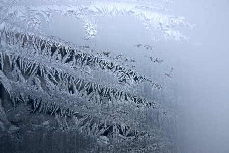 View of  frost on  glass window. Image with shallow depth of field.の写真素材