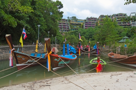 Boats on  shore waiting for tourists, Thailand.の写真素材